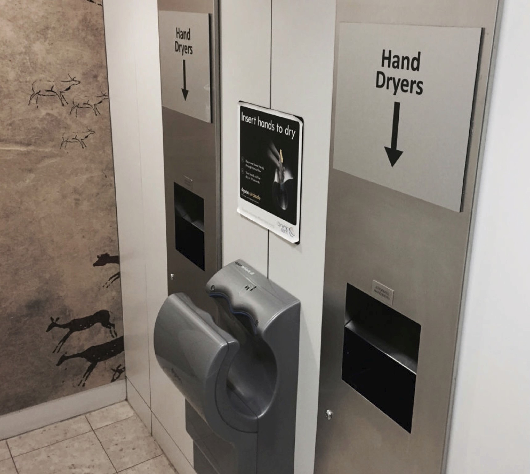 Hand dryer signs in Dynamic Earth in Edinburgh