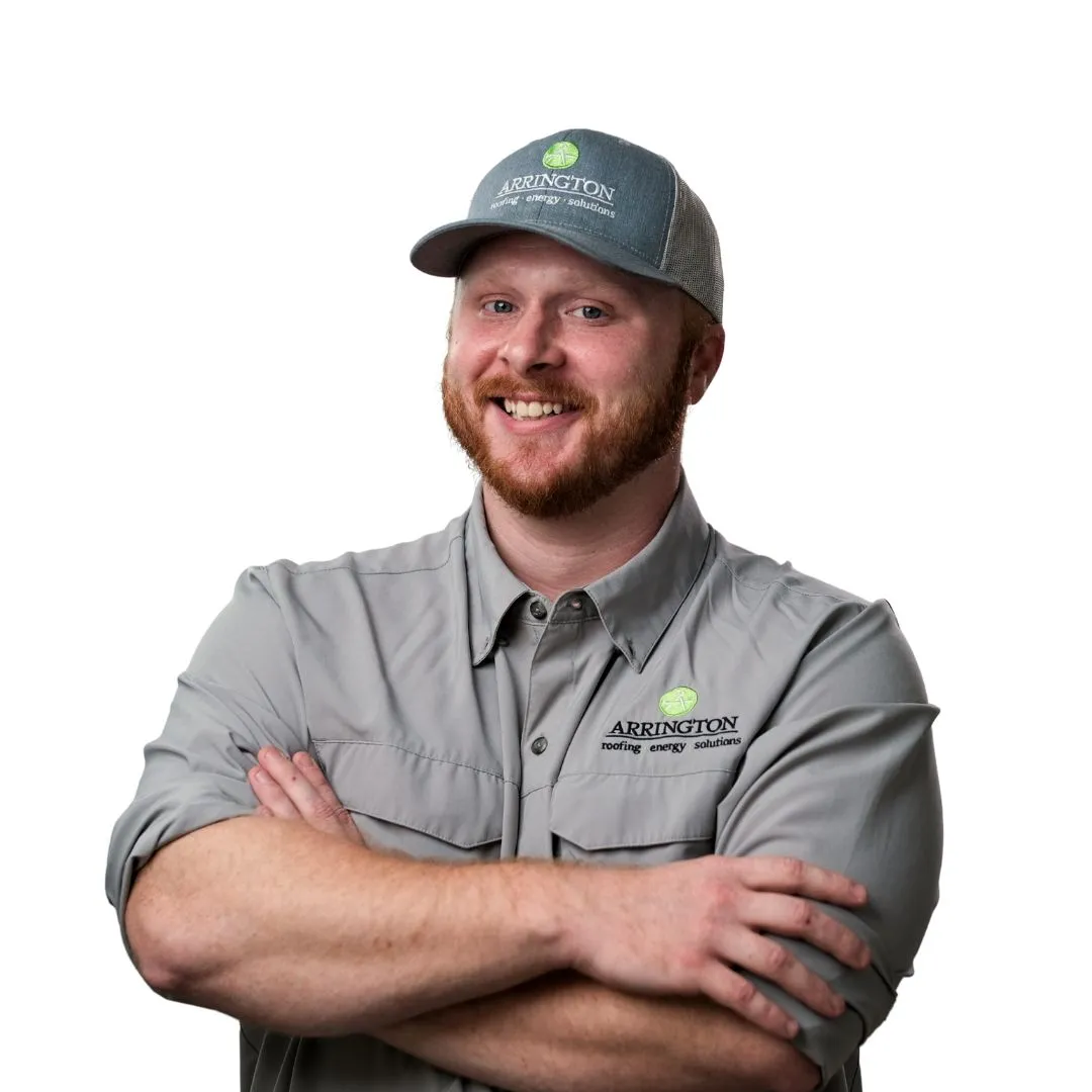 Arrington Energy Solutions employee wearing a cap and company shirt, smiling.