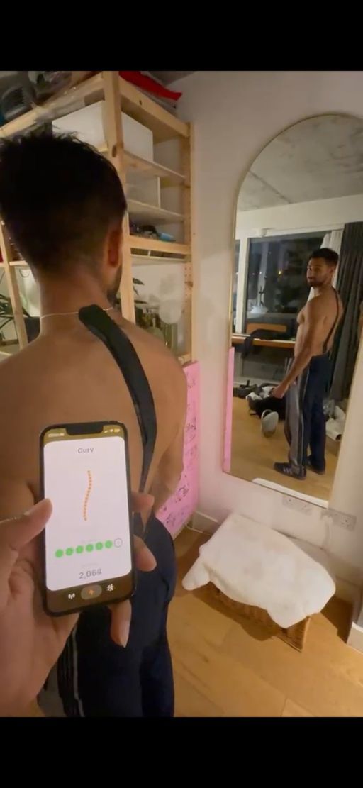 Curv sports tape worn on a back