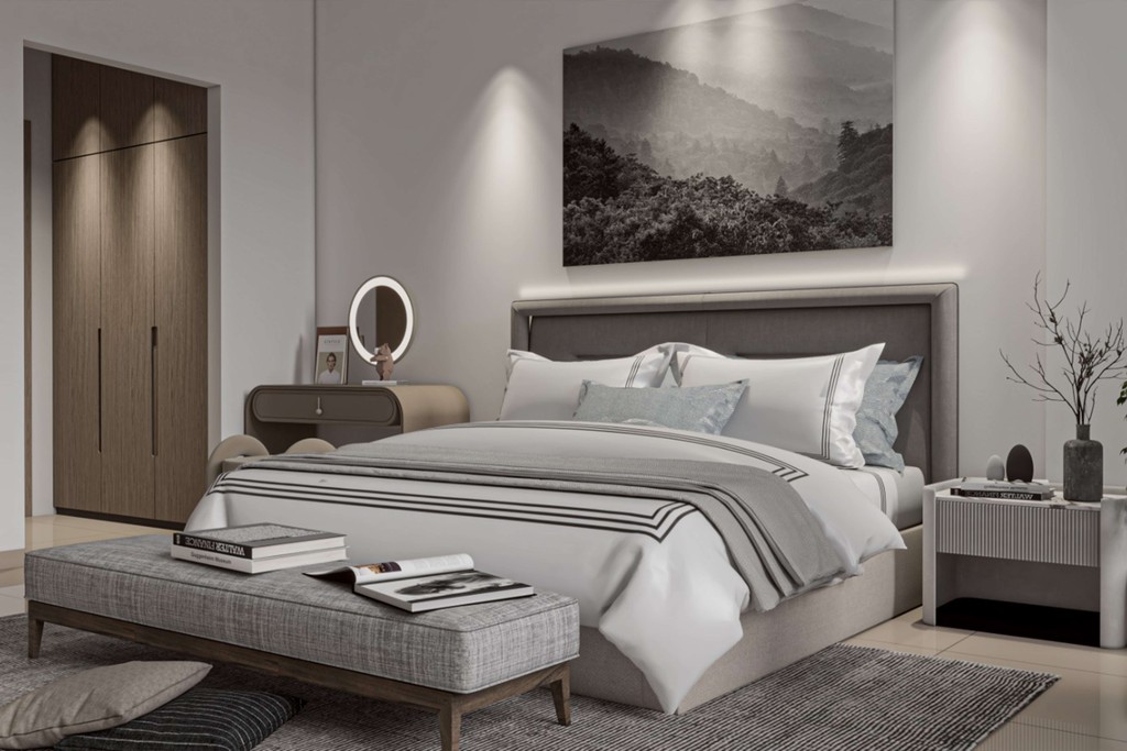 Arib Boutique A stylish bedroom with a generous bed and a prominent picture, embodying modern design elements and comfort.