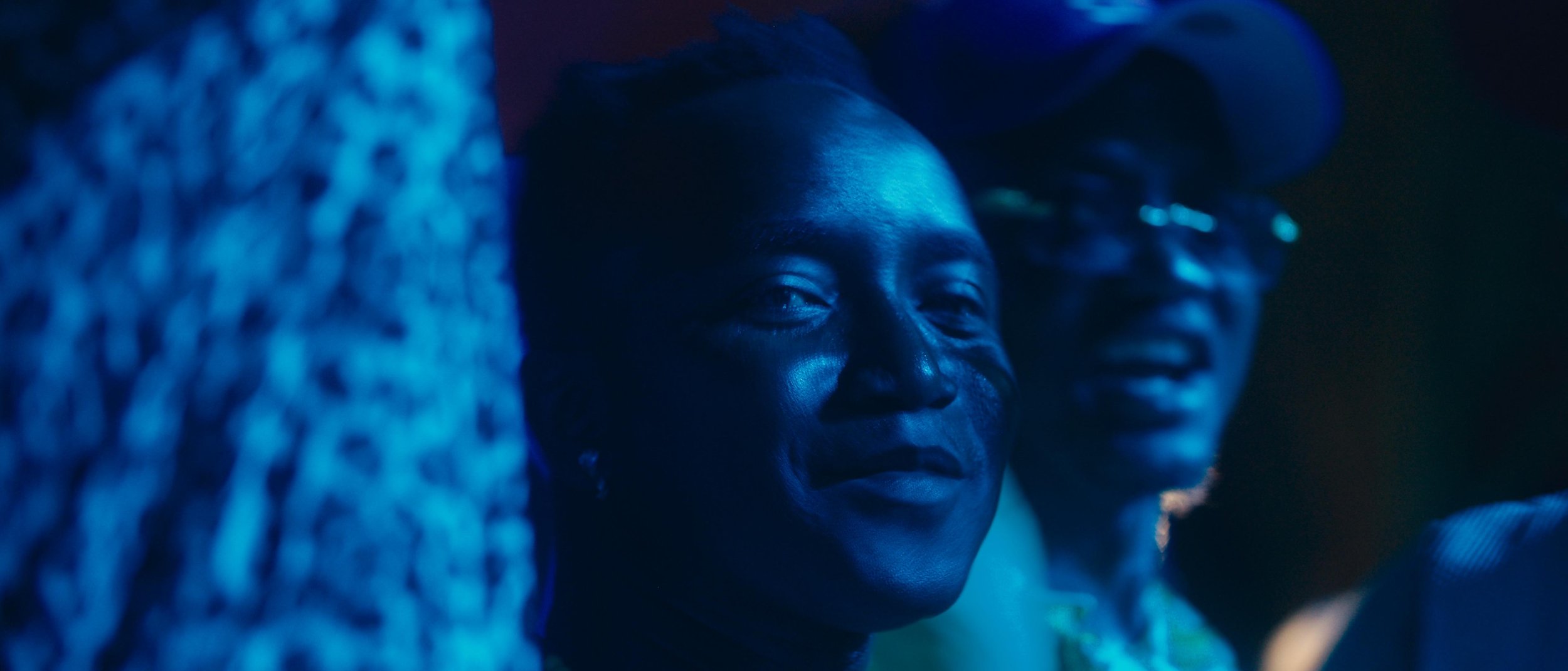 Streetside billboard with flyposters of the Batch.Works brand and illustrations