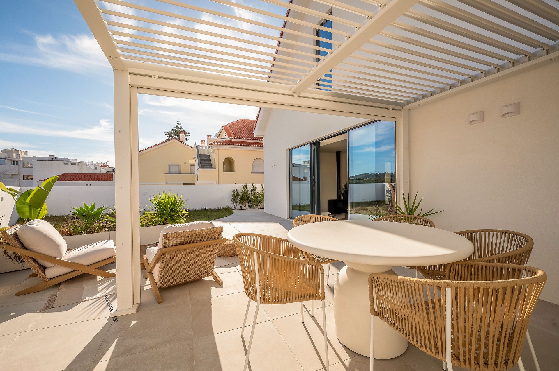 Rooftop terrace lounge area at Villa Flora
