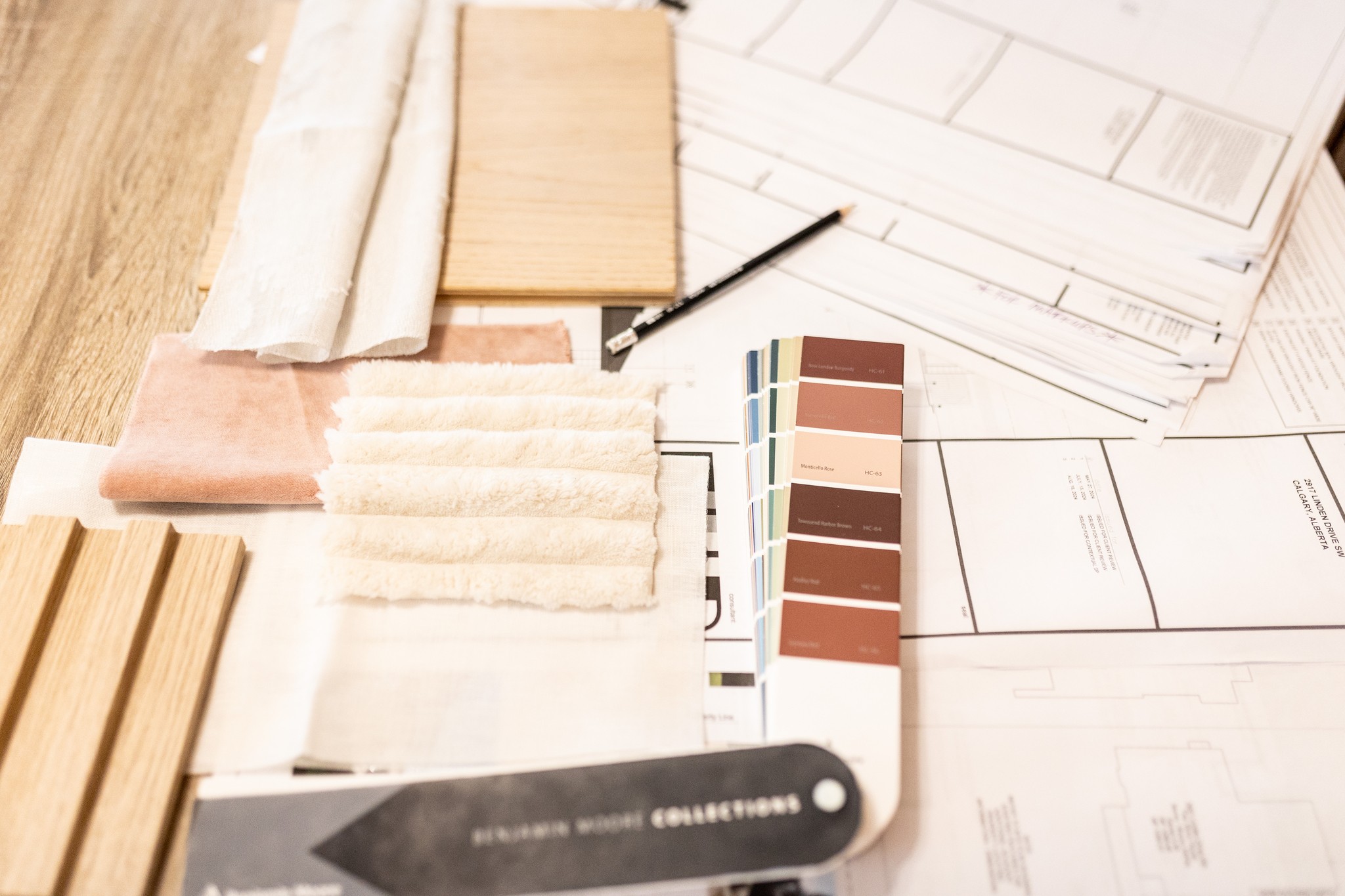 Image of KHD Homes design materials for luxury home renovations, including layout design, furniture, and window coverings selection.