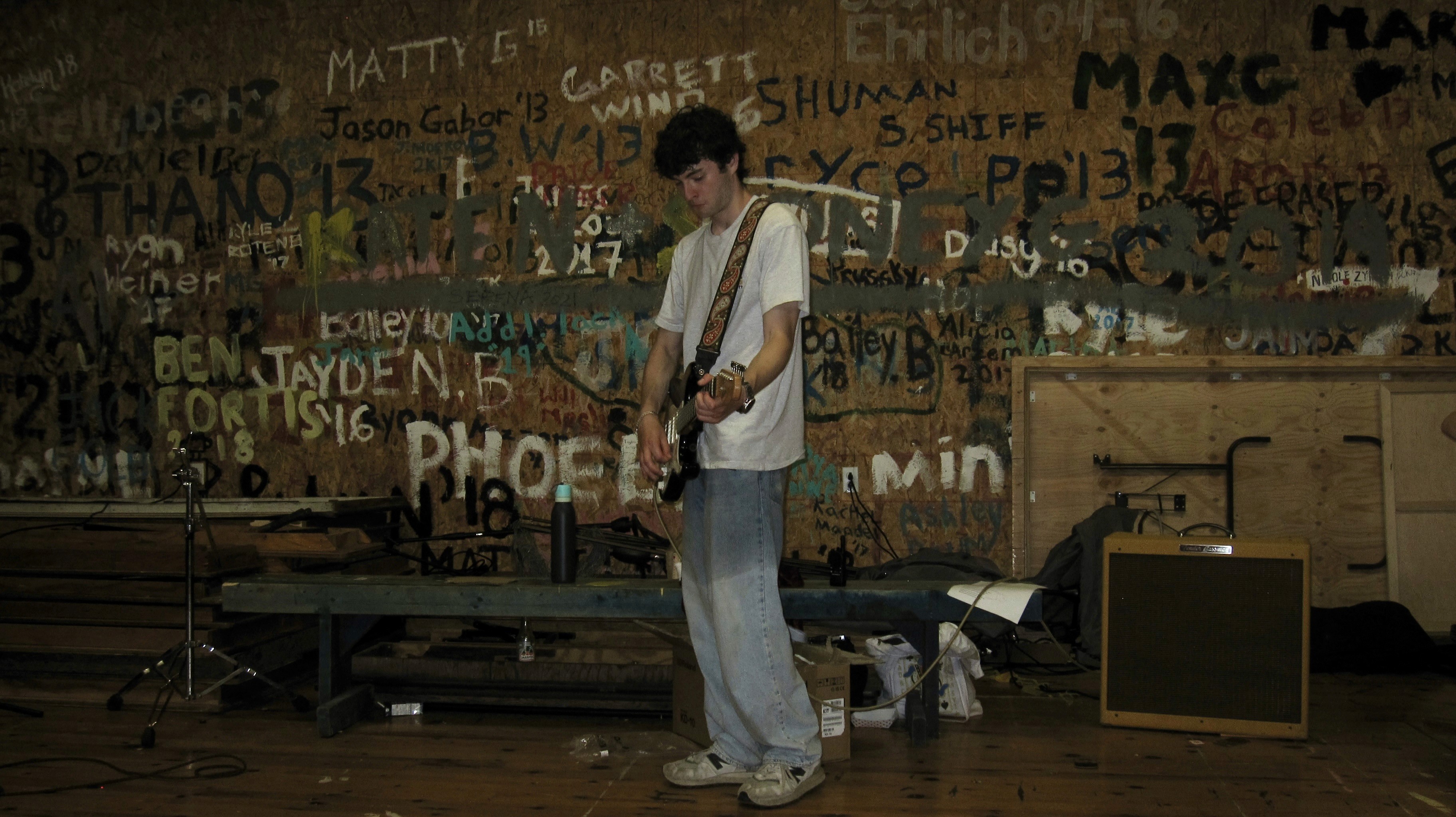 Jake Kimmel musician, artist, and music producer playing guitar