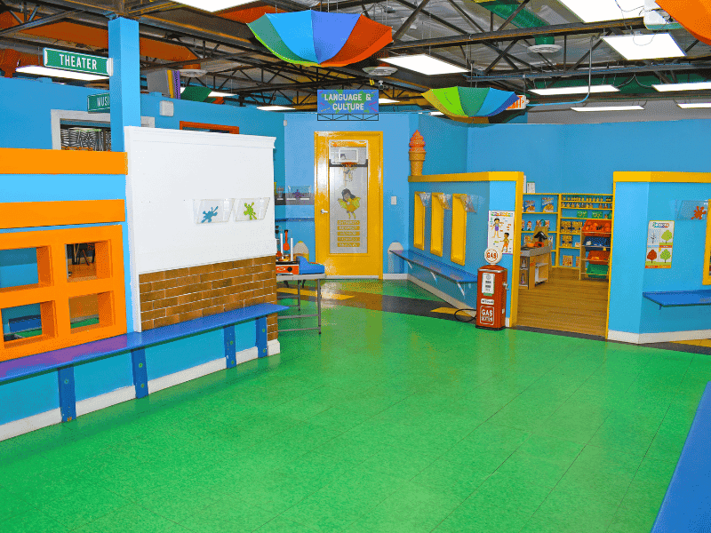 Bright indoor play area with imaginative learning spaces and activity stations at Little Adventures Academy preschool in Scottsdale, Arizona.