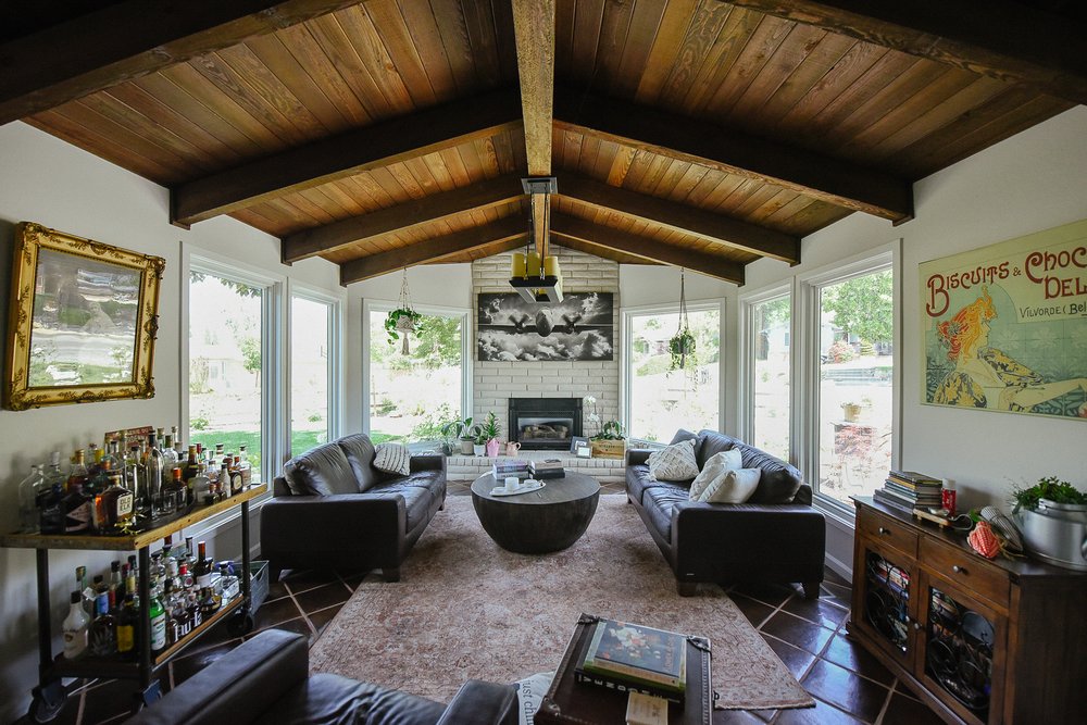 two people looking at a tablet and smiling