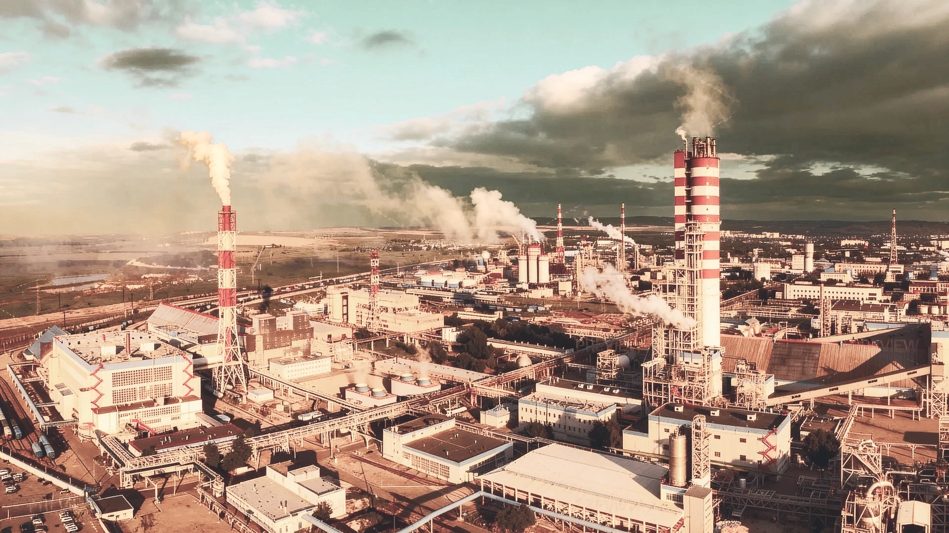 Industrial pipes and machinery in a factory