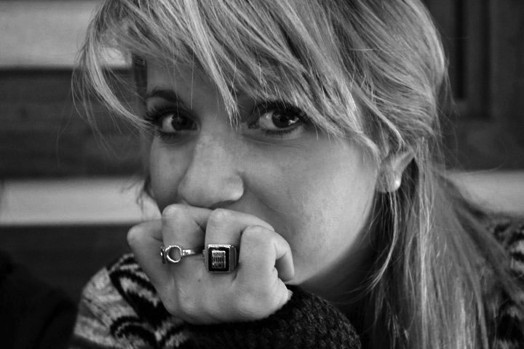 woman with bangs and rings