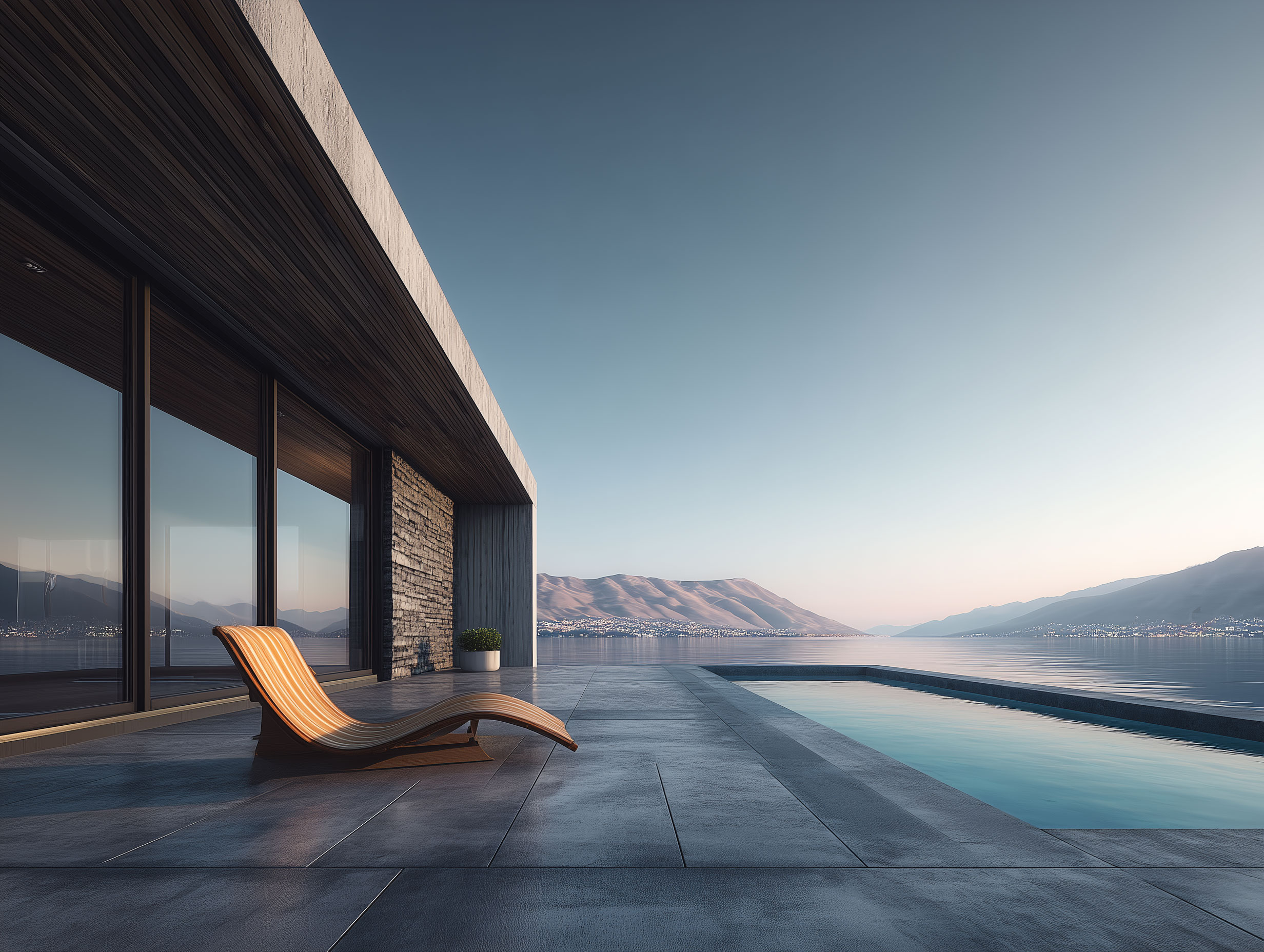 Concrete terrace with infinity pool overlooking Lake Como, calm surface and horizon.