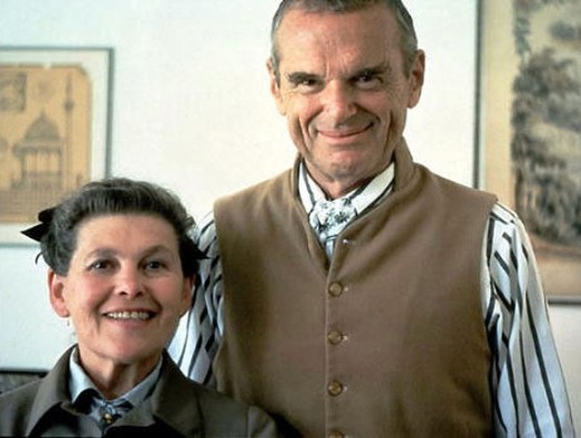 A photograph of a man and woman smiling.