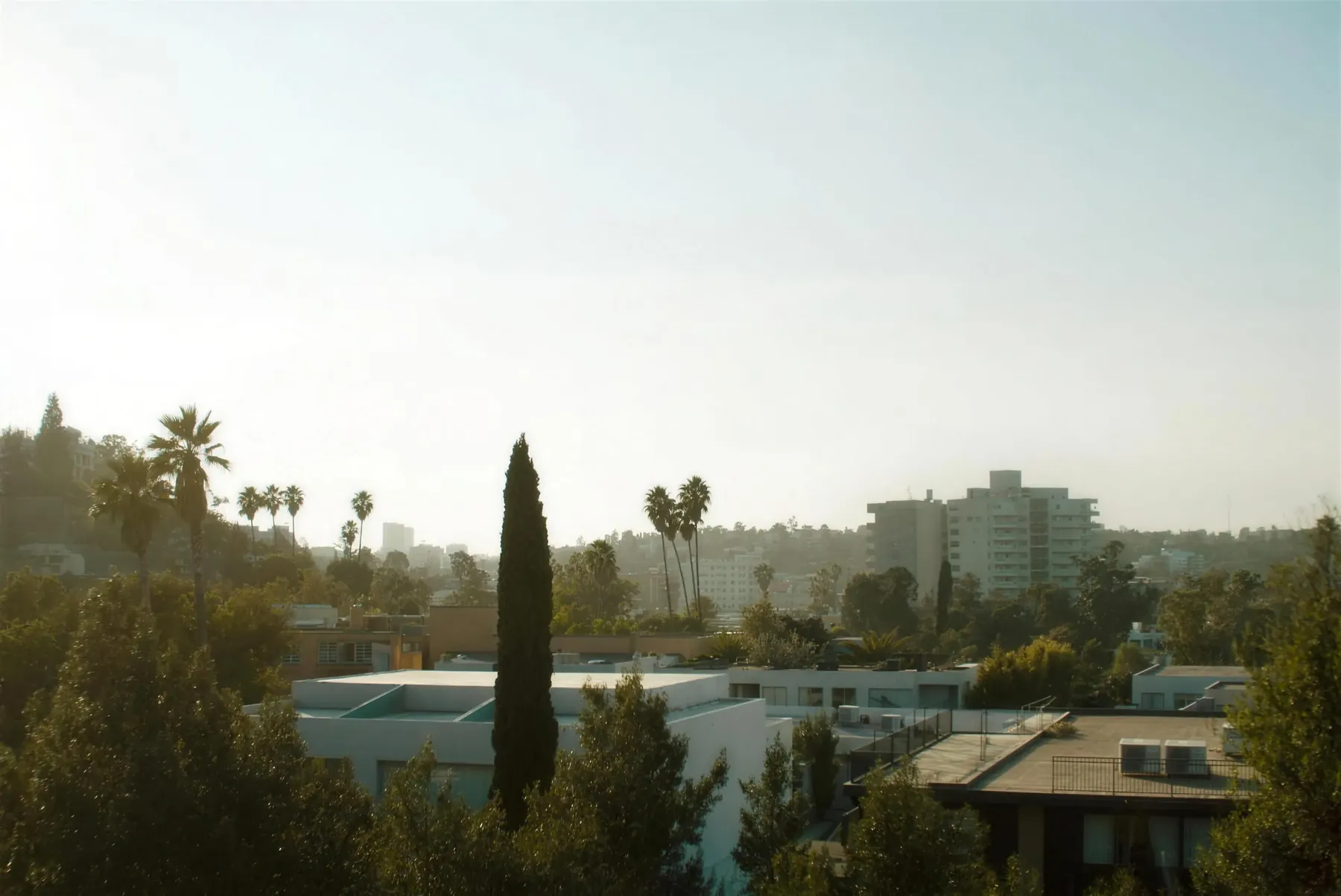 Los Angeles neighborhoods from the hills at golden hour