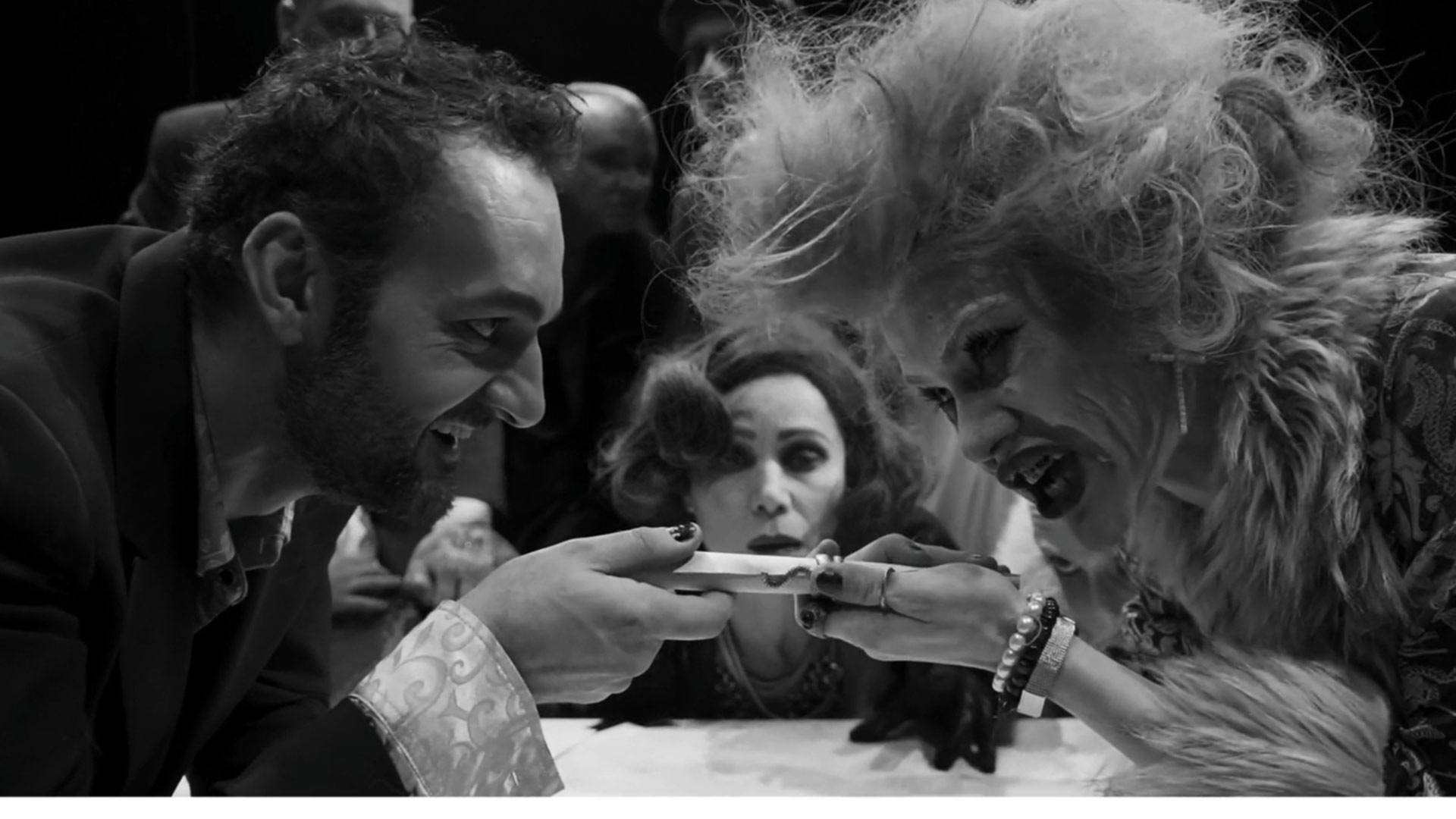 A person stands in a sandstone cave.