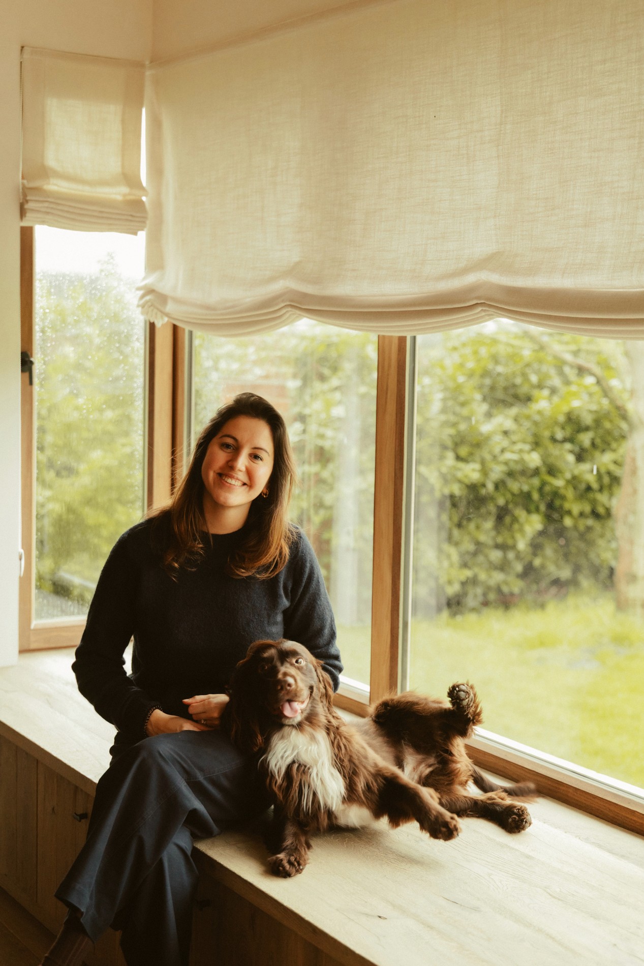 a blurry photo of a person standing in front of a wall