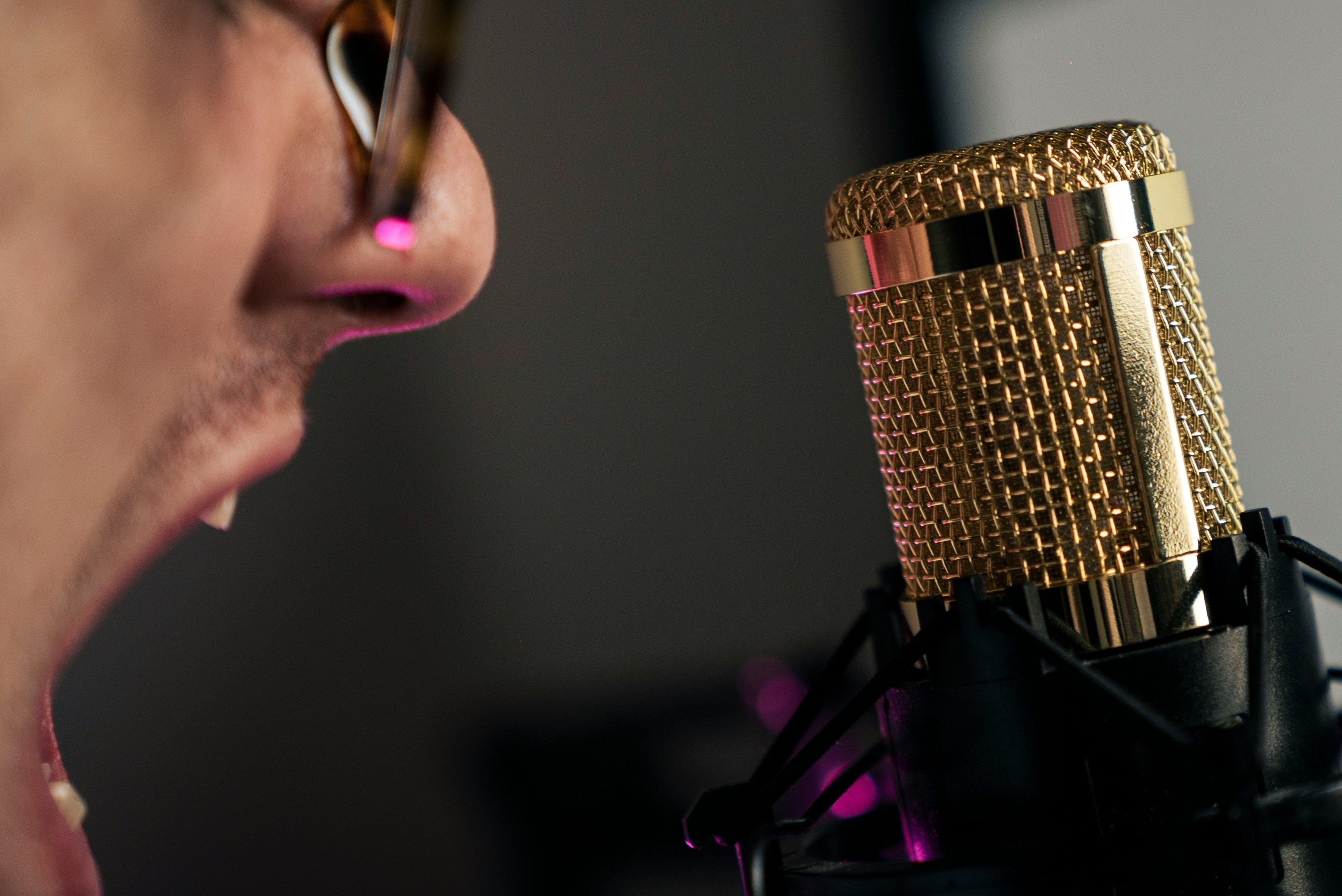 Man singing into studio mic