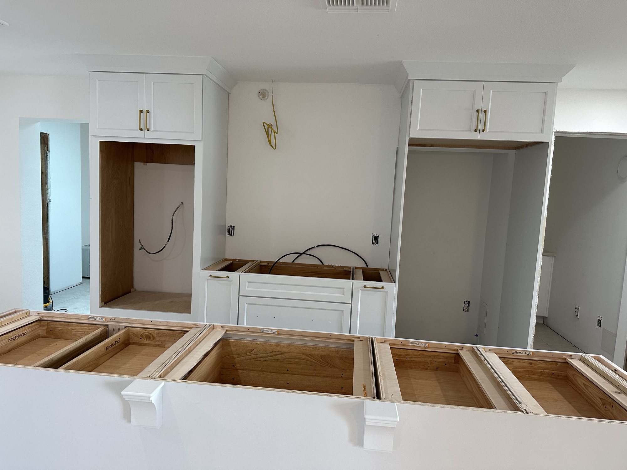 White Kitchen with a Large Island in Ruskin, Florida — photo 3