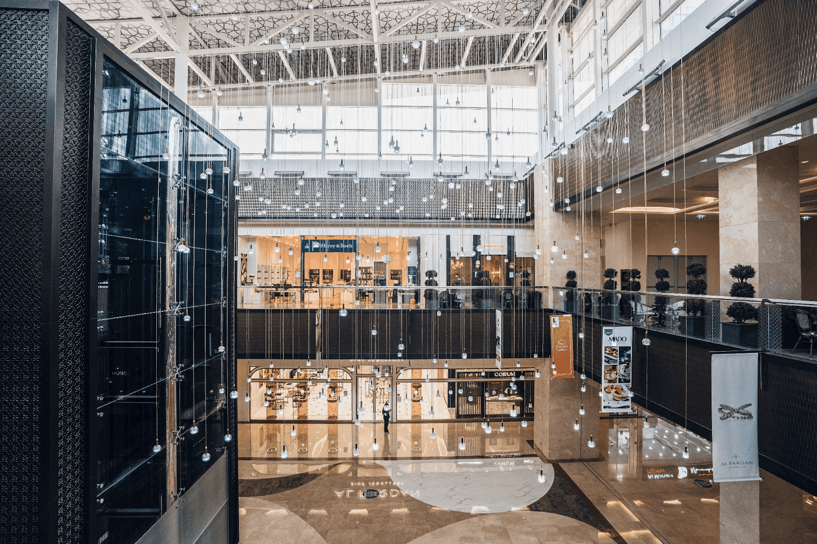 Elegant retail boutiques and high-end shops line the main corridor of Nation Towers Mall.