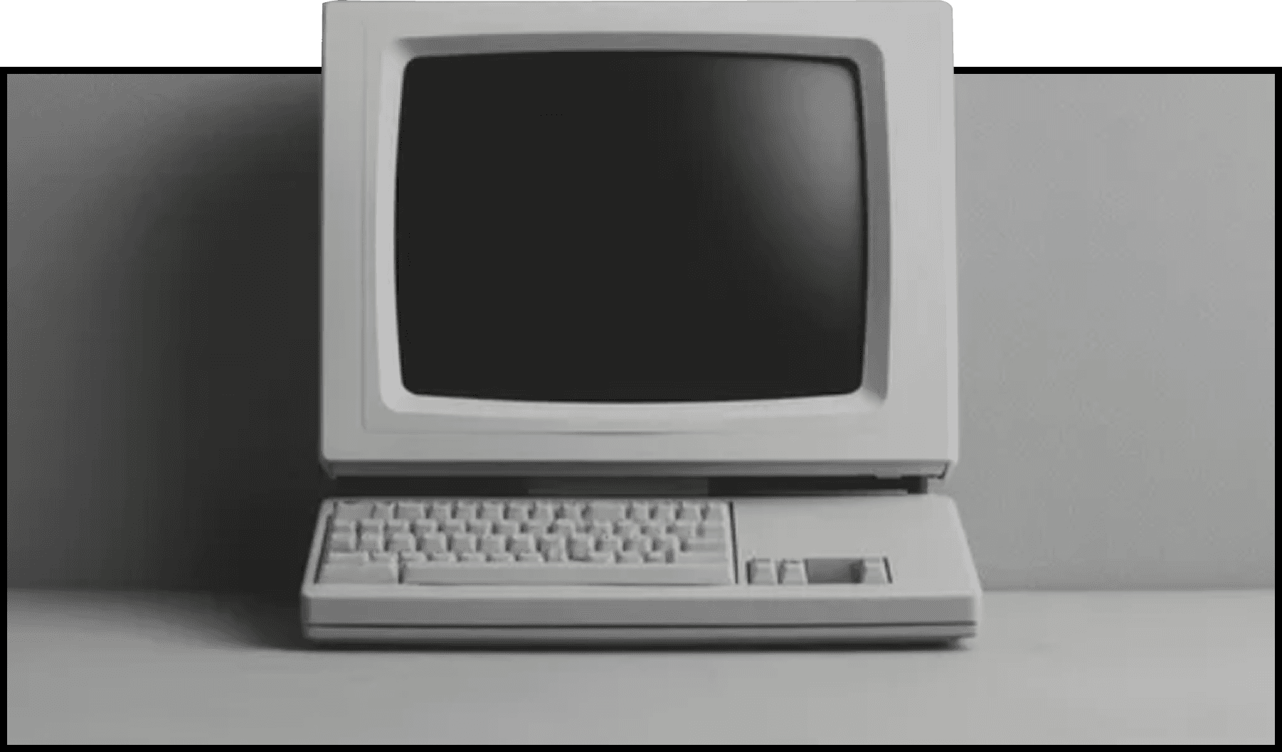 A retro computer on a desk