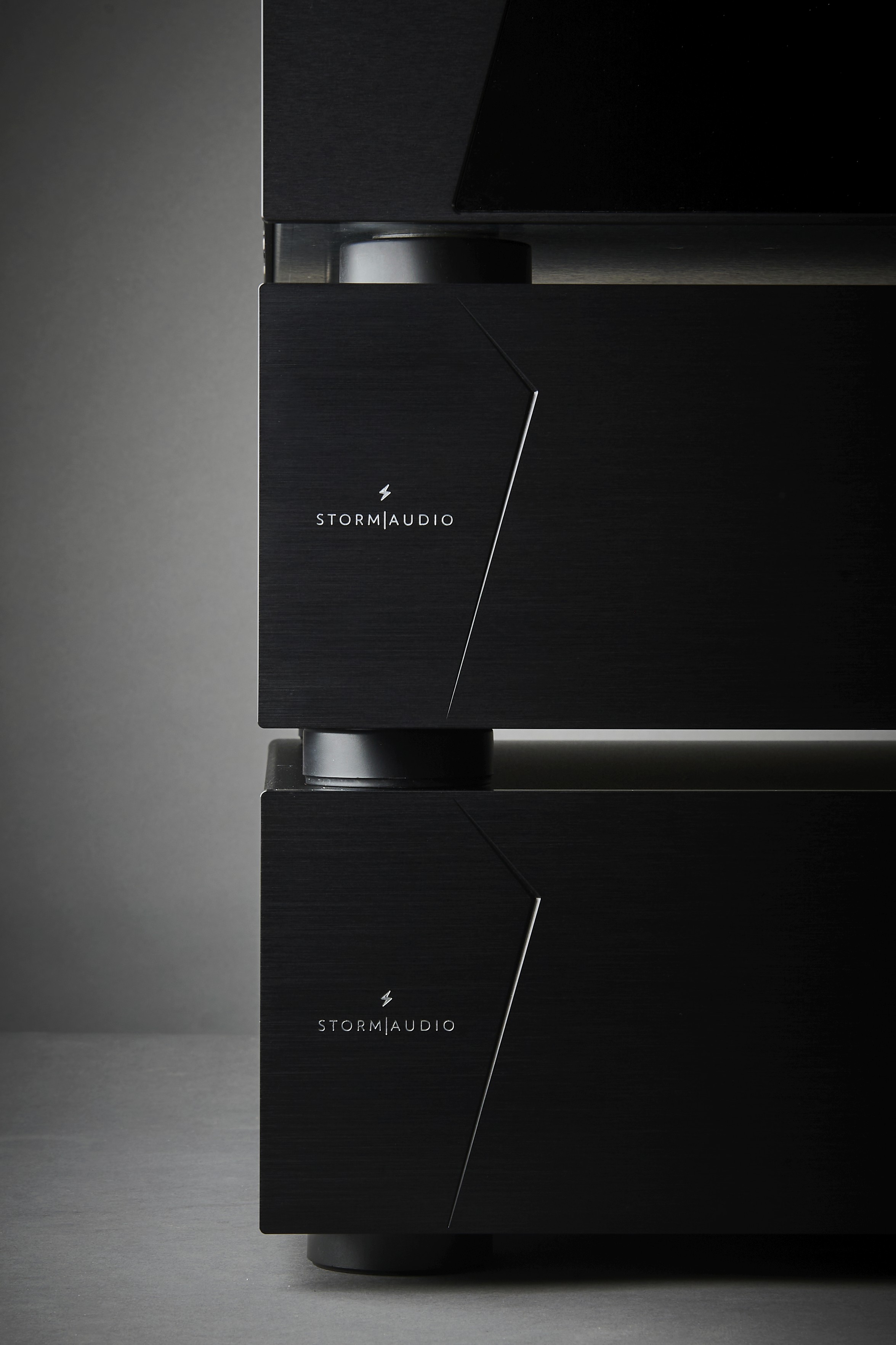 Black Storm Audio stack with brushed metal finish.