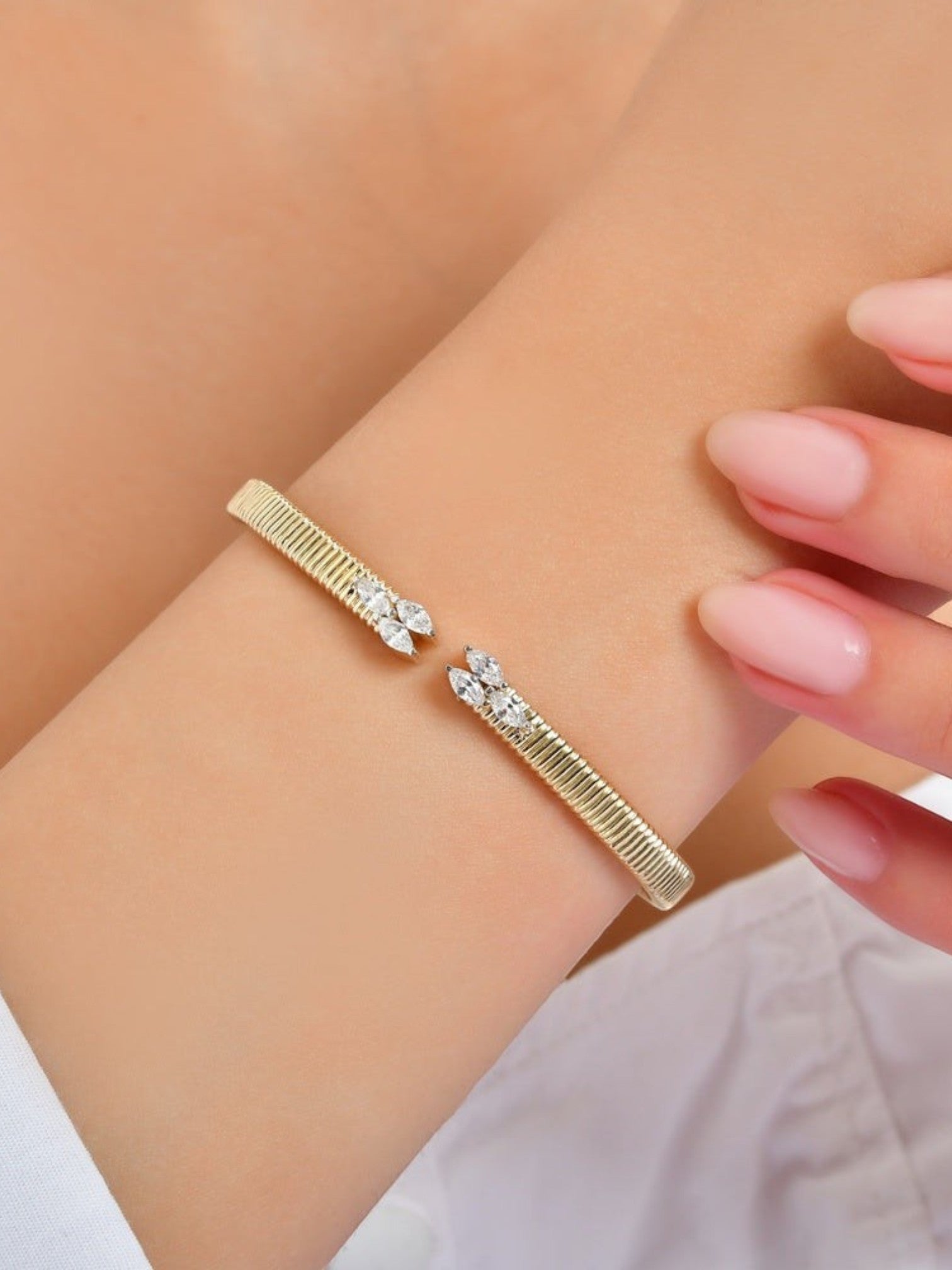 Dazzling 14K Gold Stone-Studded Bangle Bracelet - Elegant Design for Women