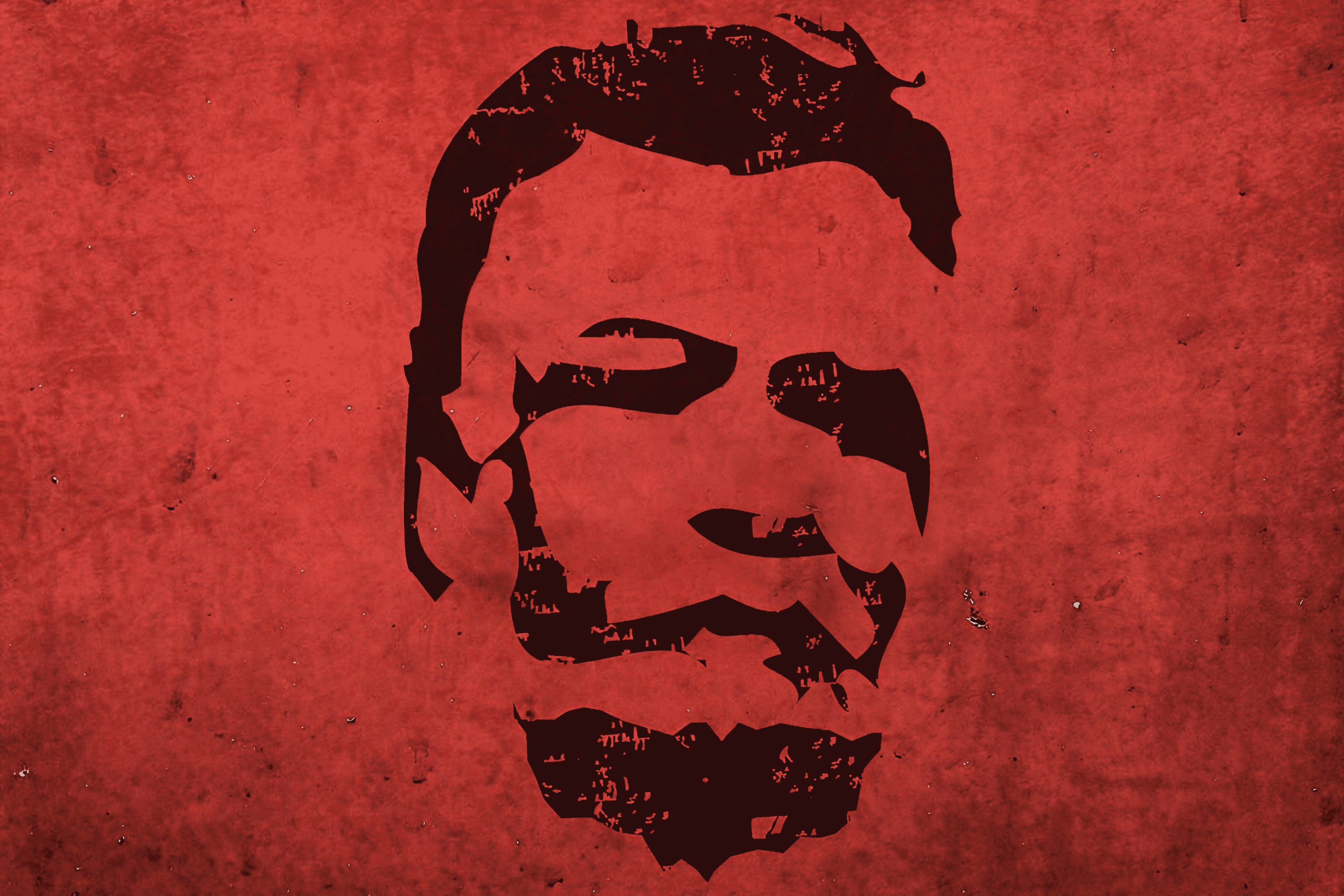 Silhouette of Lenin's profile on red distressed background