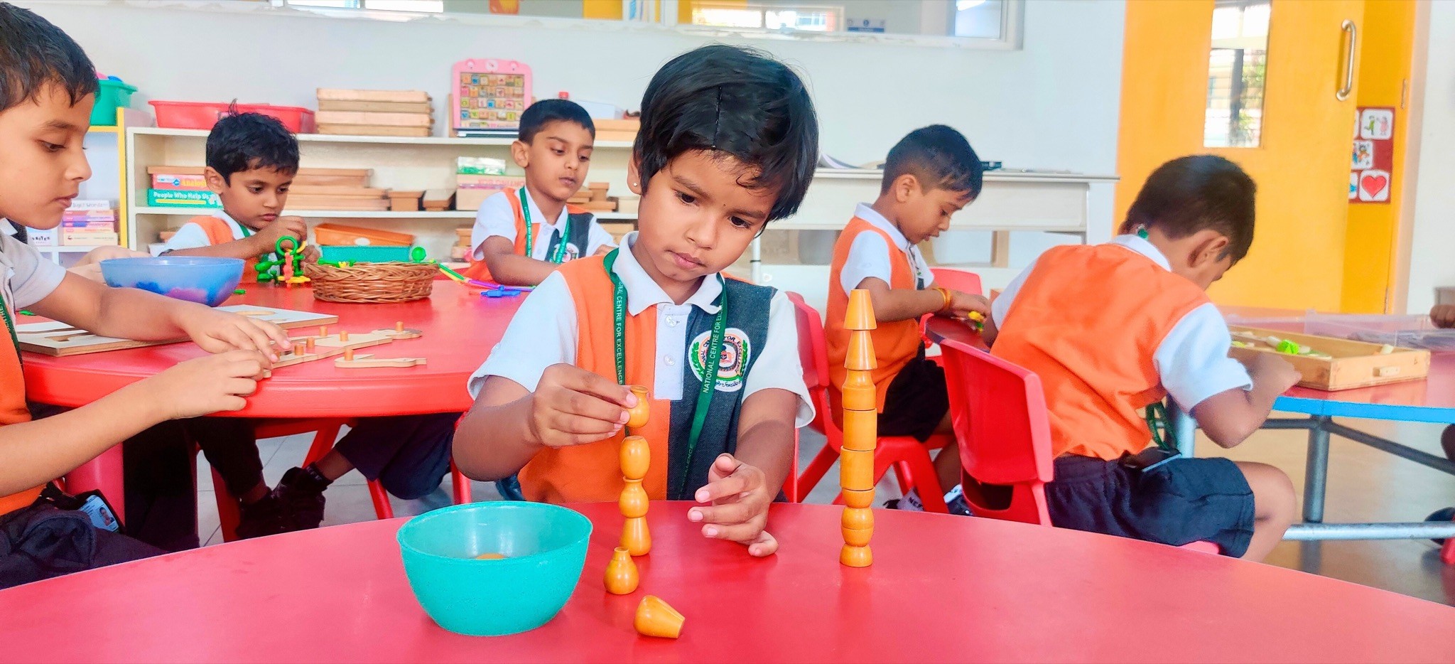 NCFE — pre-primary children in a hands-on counting activity