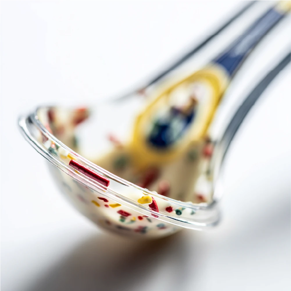 Abstract material close-up showing colored specks, representing industry analysis.