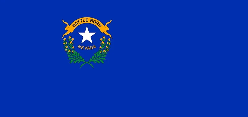 Blue flag featuring a white star, encircled by a green wreath and yellow flowers, with "Battle Born" and "Nevada" on a yellow ribbon above.
