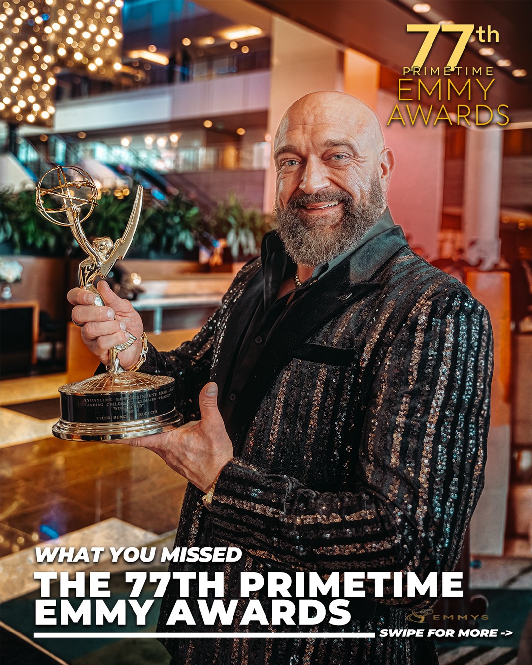 Landon Brittain at the 77th Primetime Emmy Awards holding Emmy trophy in Hollywood.