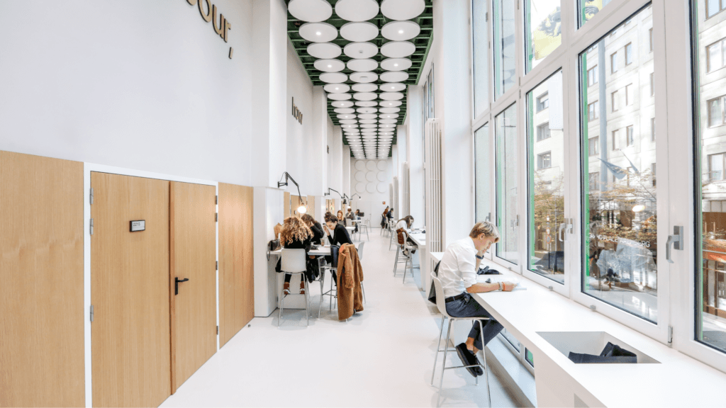 a black and white living room with a large tv