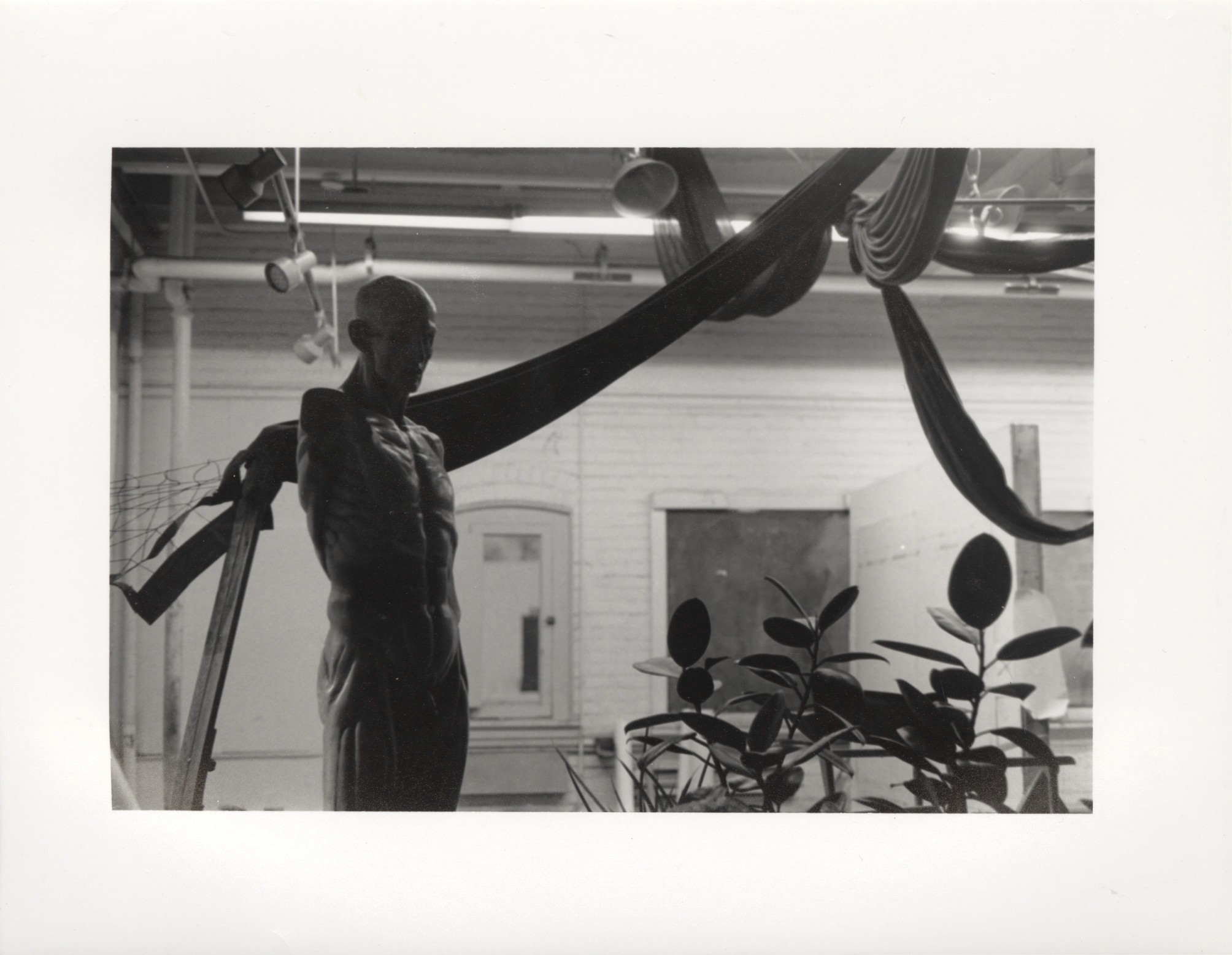 two cell phones on a gray surface