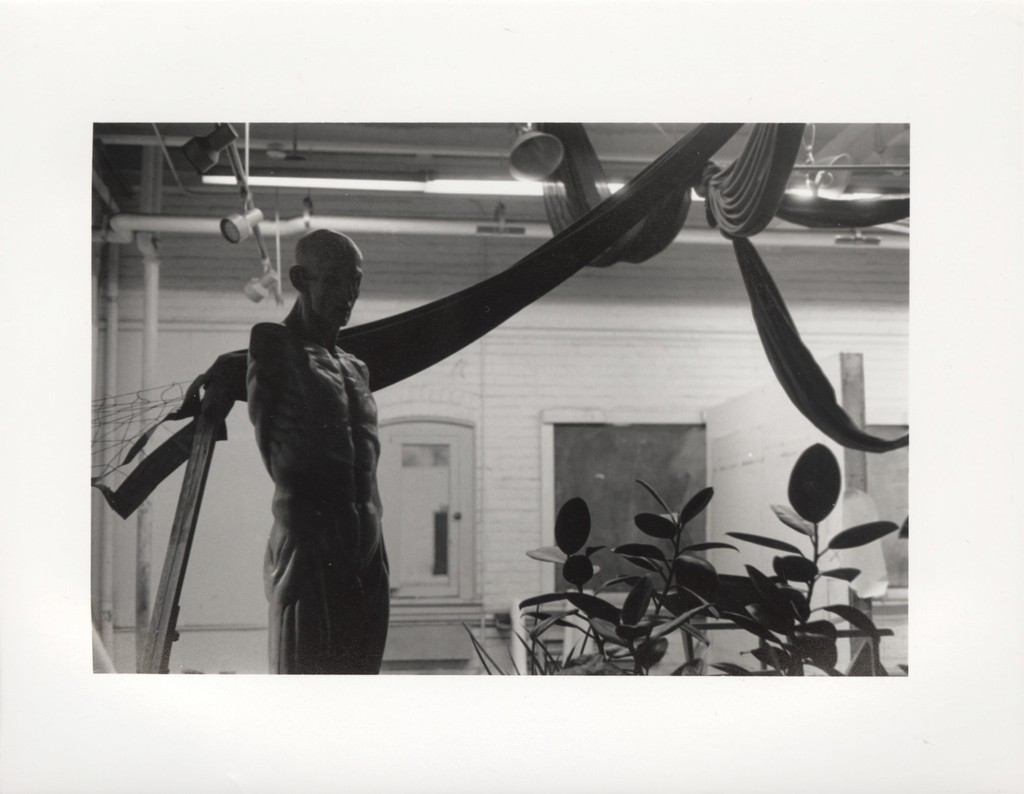 two cell phones on a gray surface