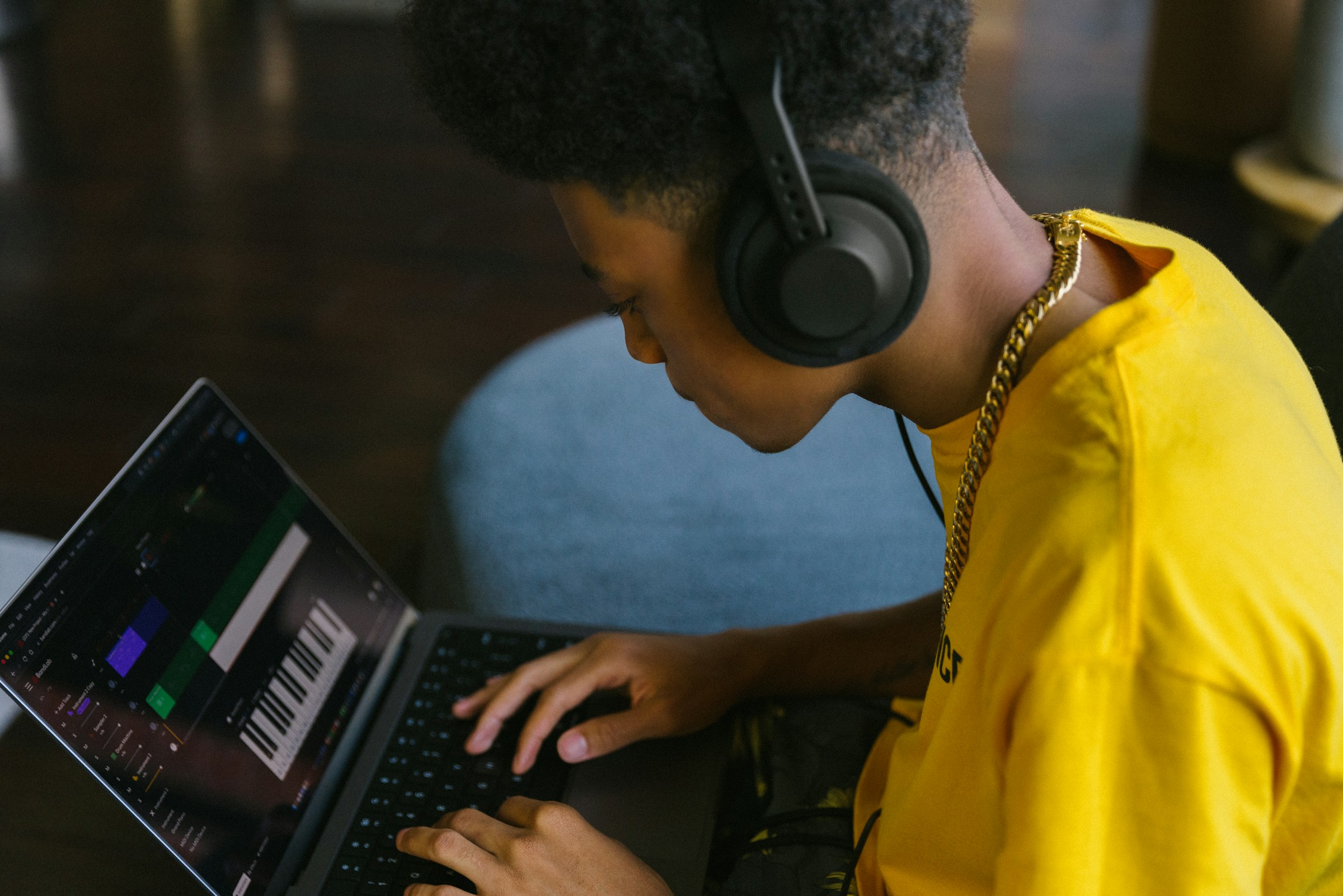 boy on production app - How to Become a Music Producer at a Young Age