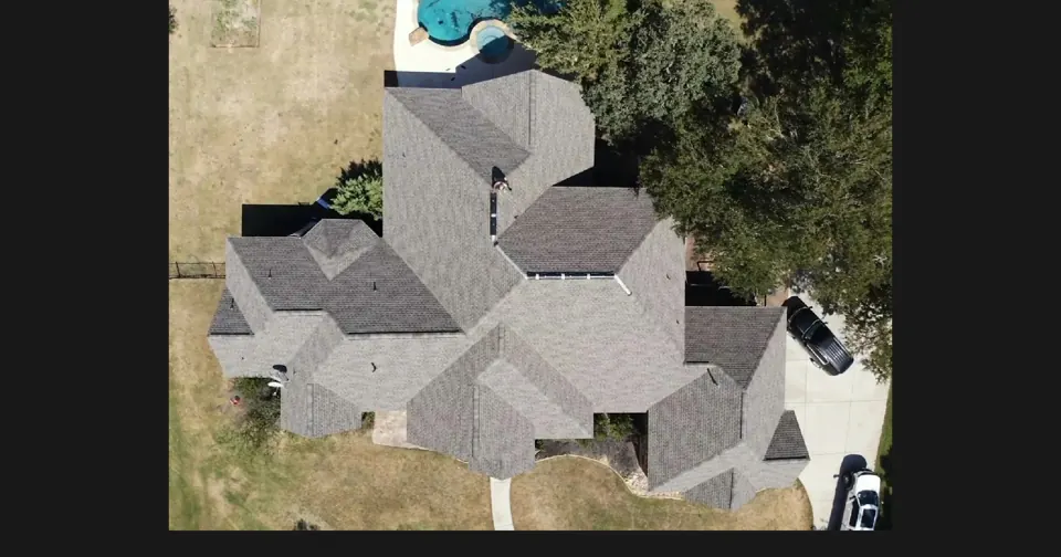 Aerial view of the architectural shingle roof in Georgetown, Texas, completed in 2023; roof overview used to introduce the installation topic.