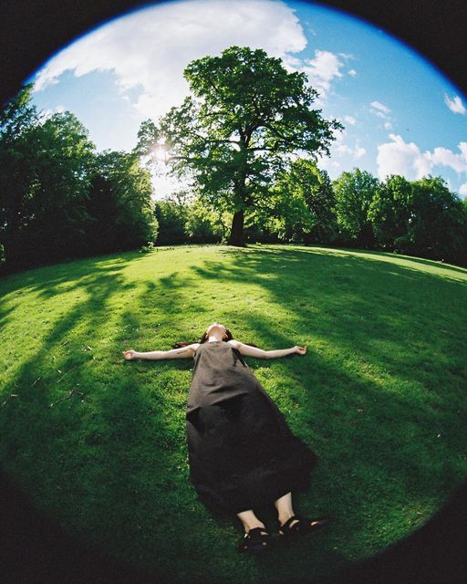 Woman laying in the grass