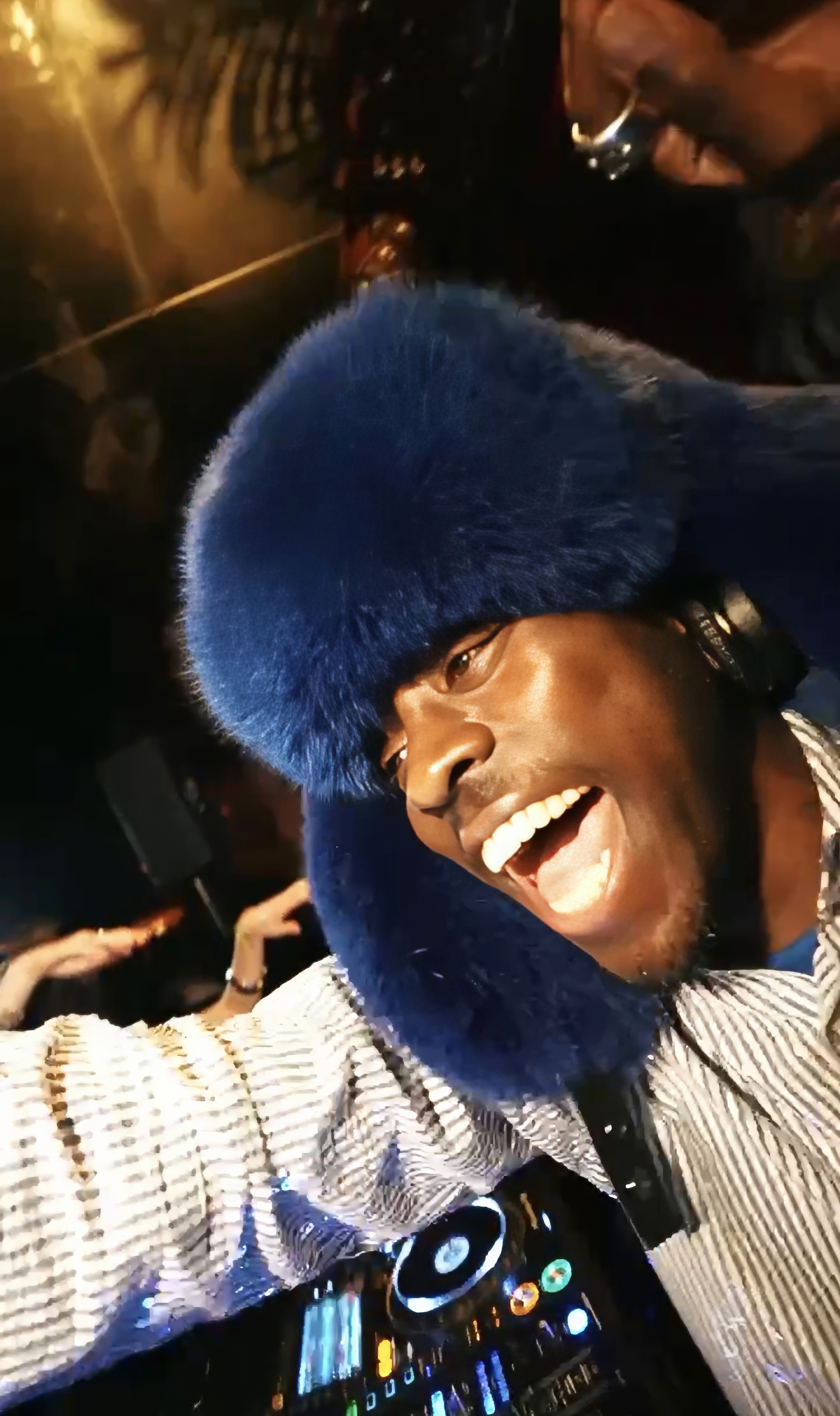 Couple embracing on street, bride's face obscured