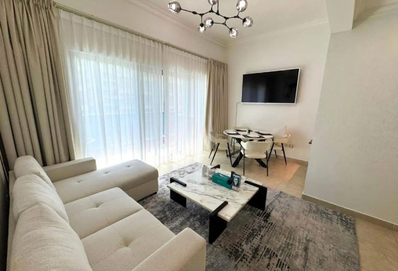 Modern, bright interior living room of an apartment for sale in Zumurud Tower Dubai Marina.