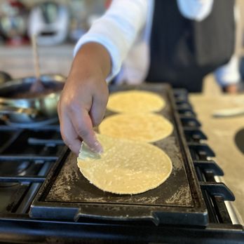 Placing Tortilla On Grill