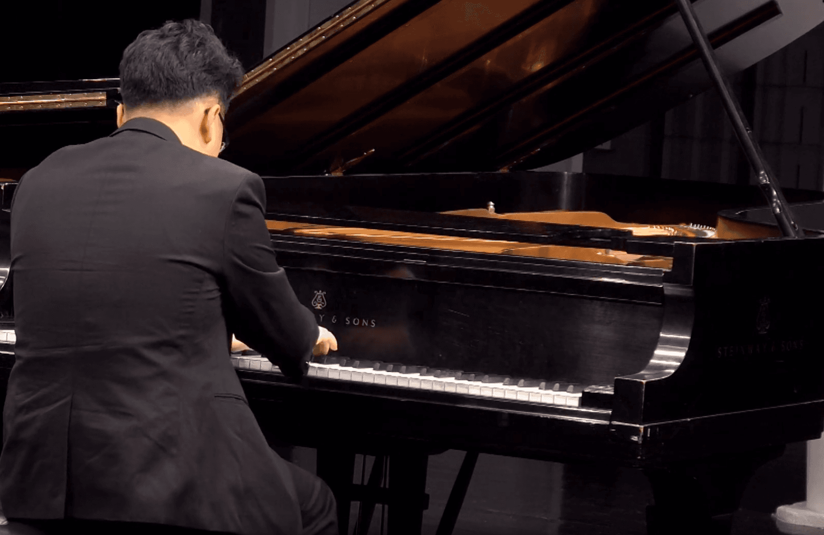 Meyer Nam playing piano