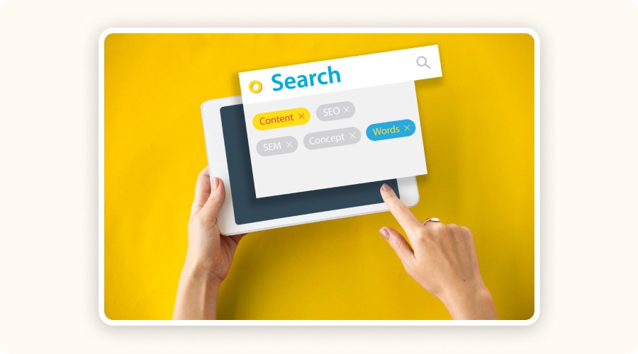 SEO keyword research on a tablet, showing “Content” and “Words” on a yellow interface.