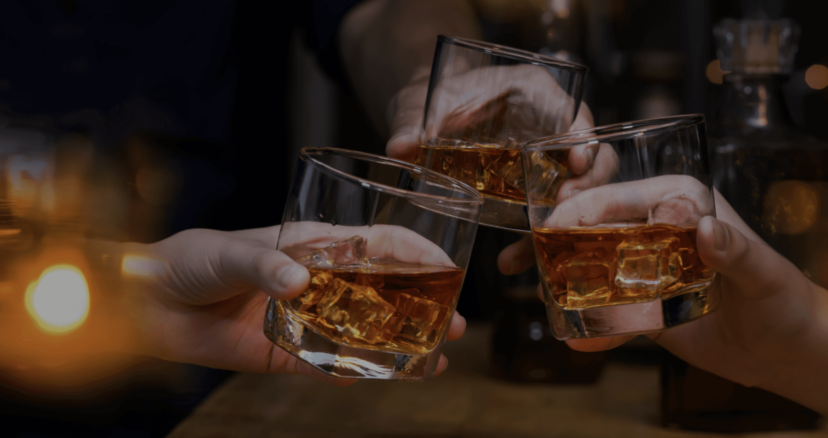 Close-up of an eye with creative makeup and white feathers.