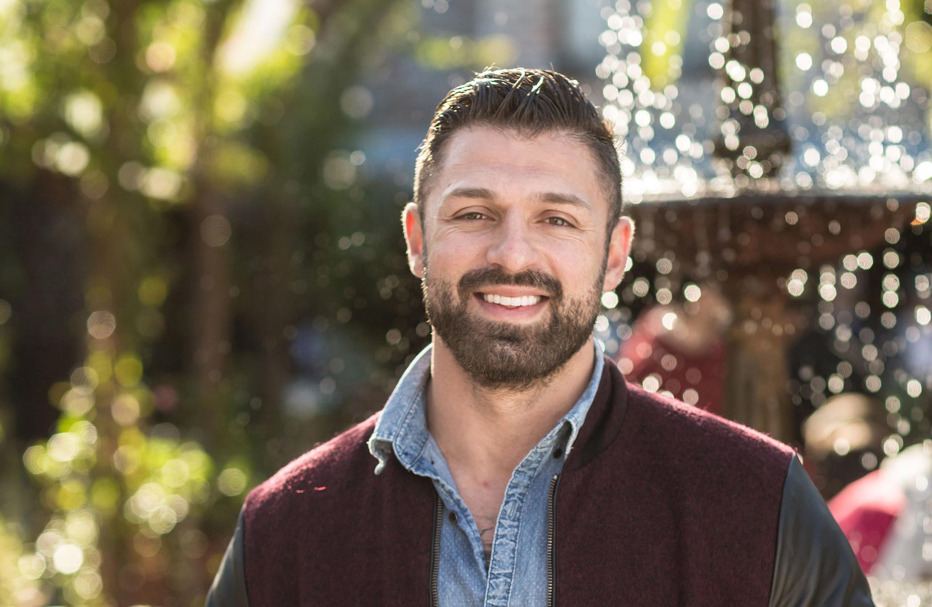 man in black hoodie standing