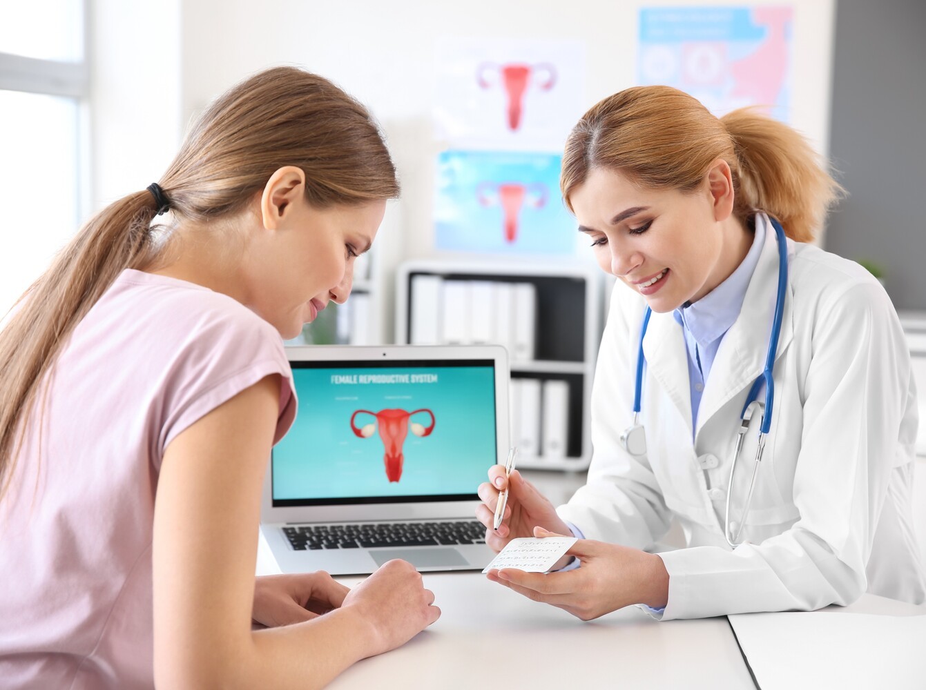 woman talking to her doctor about how to prevent weight gain on birth control and what birth control is right for her