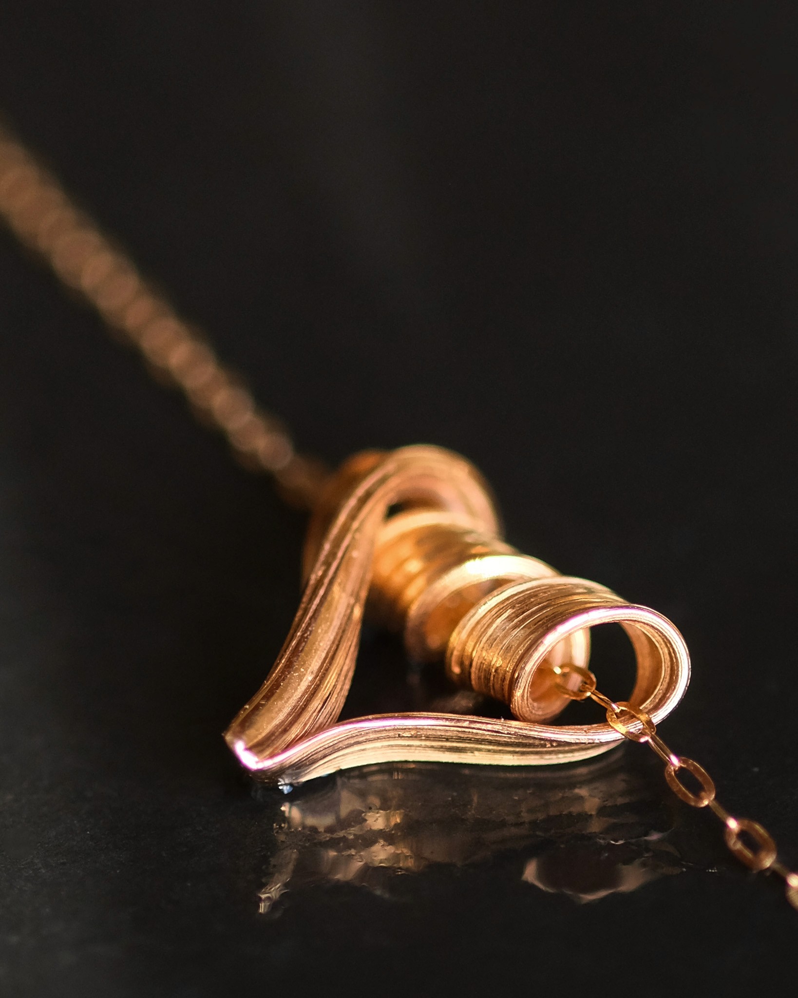 Textured heart pendant in rose gold