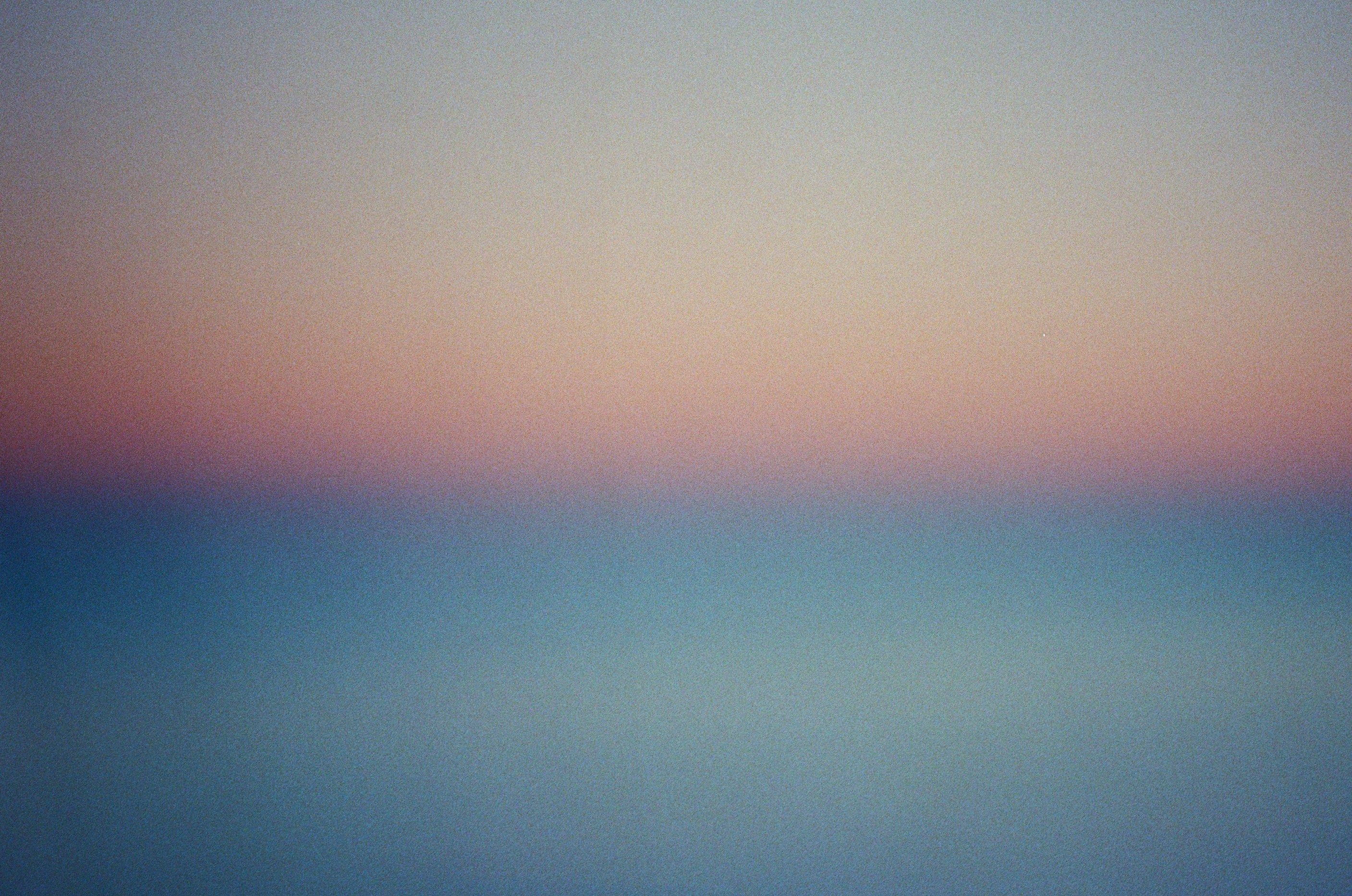Soft gradient of blue and pink hues