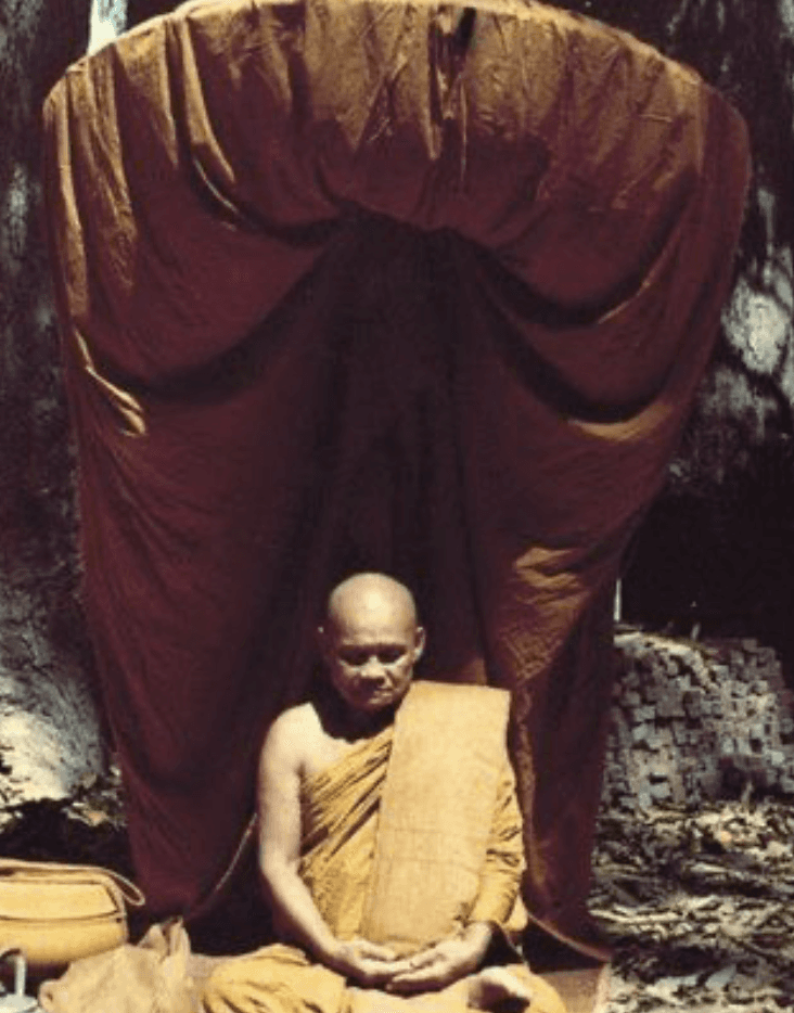a group of women standing on top of a sandy beach