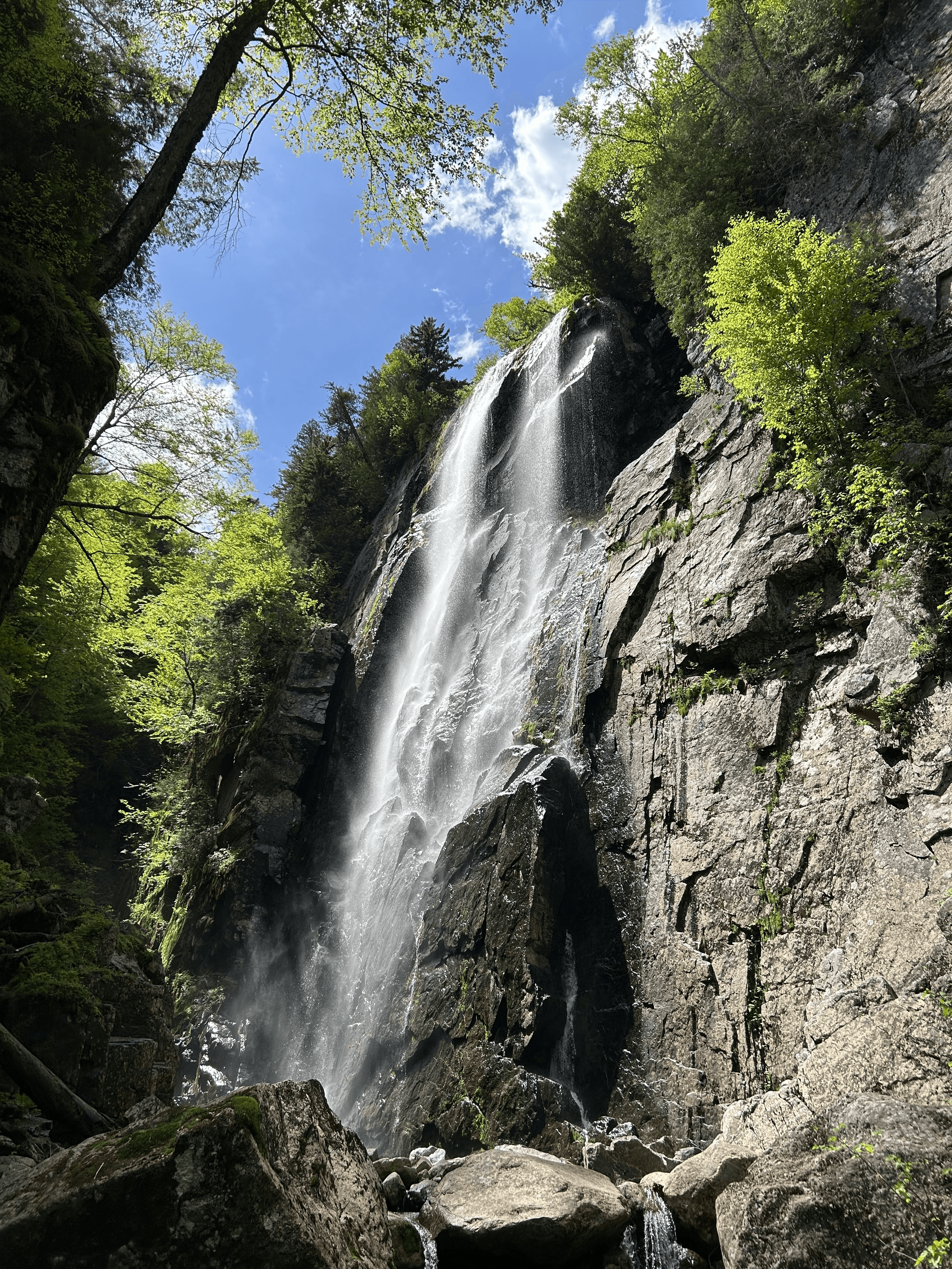 man filming on beach