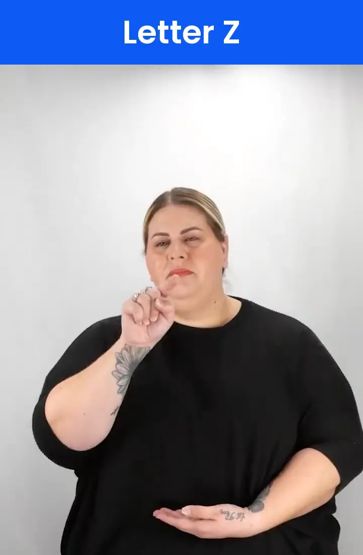 A Deaf signer signs Z in ASL