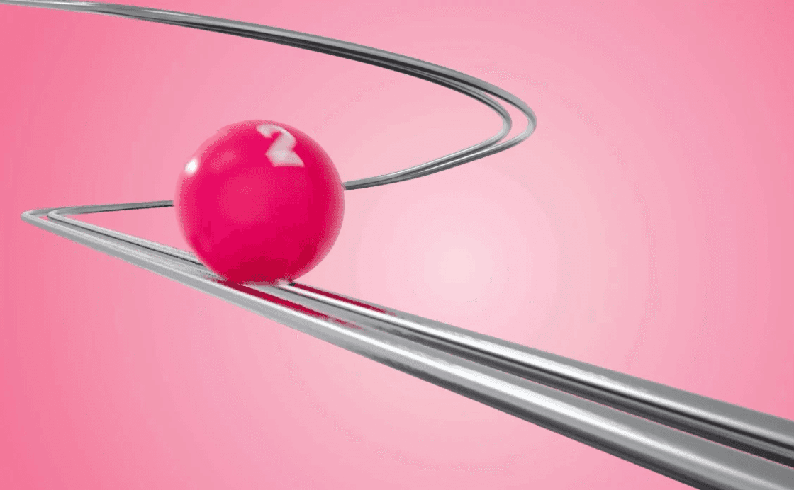 Excerpt from official Eurodreams draw animation, showing wining ball rolling on track.