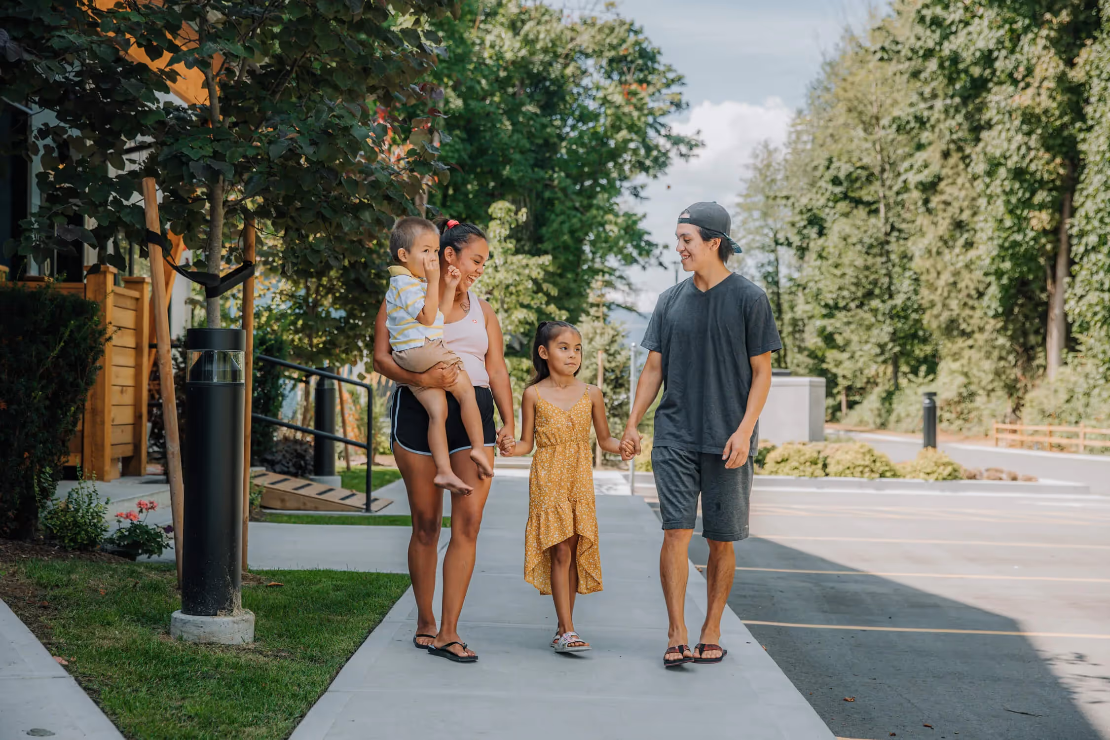 Ch’íyáqtel First Nation lifestyle photography featuring people in an outdoor setting