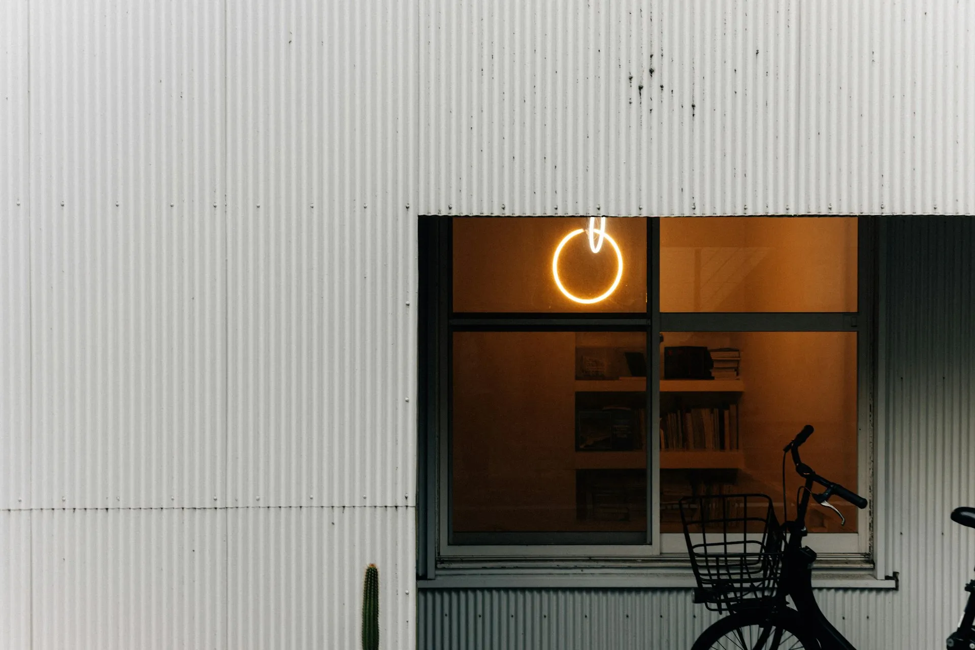 bycile infront of a studio window